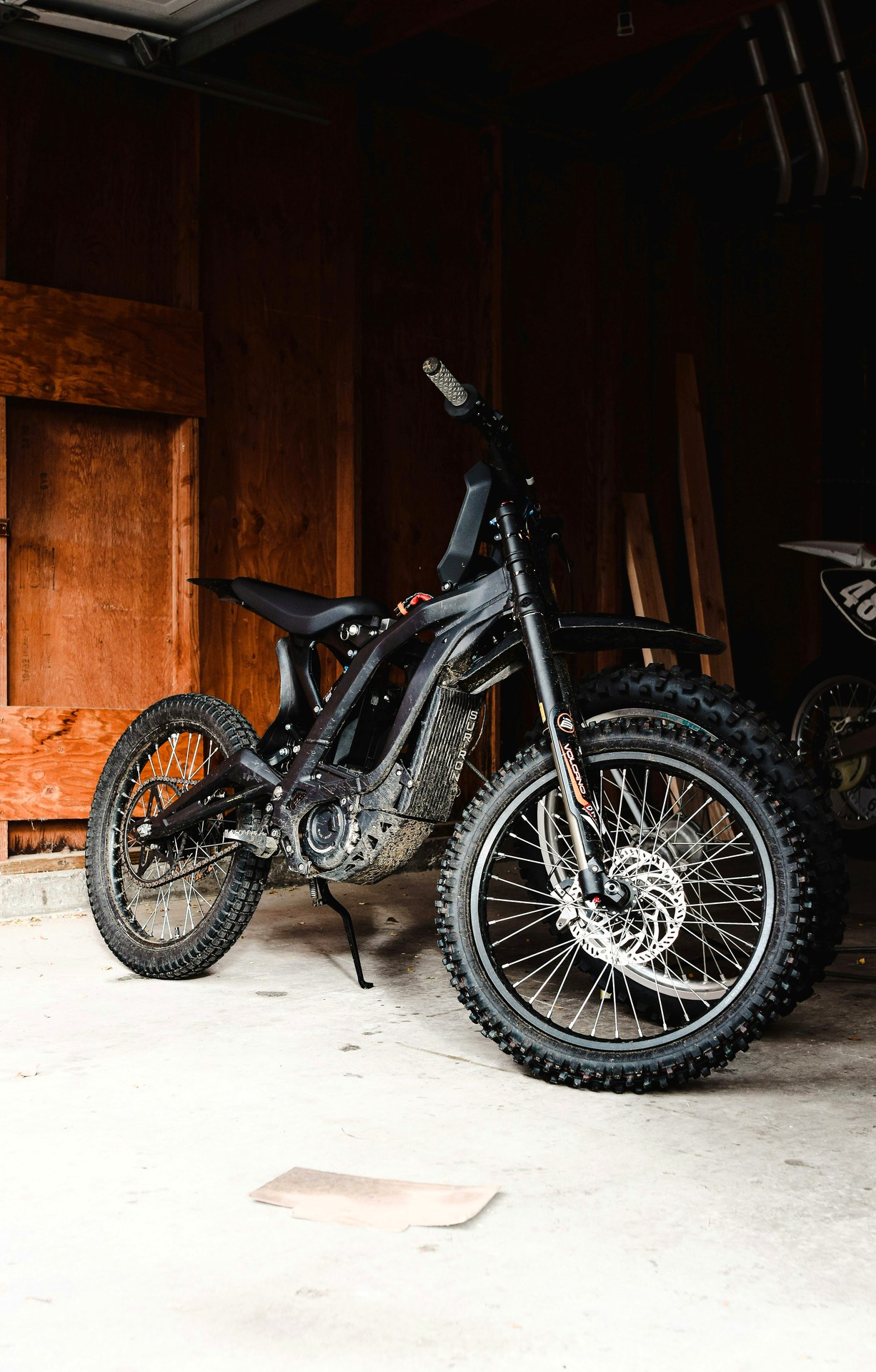 Electric off-road motorbike in garage